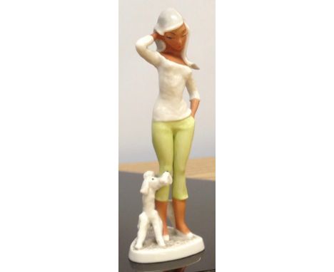 A RARE W. GOEBEL WOMAN IN 50'S DRESS AND DOG FIGURE DATED 1957 BY A. MULLER, MODEL G.F. 132, 21CM 