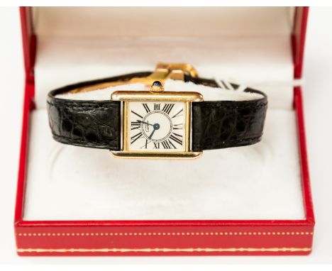 Cartier, a ladies Must De Cartier gold plated Tank wristwatch, 2cm rectangular silvered dial with Roman numerals, sapphire se