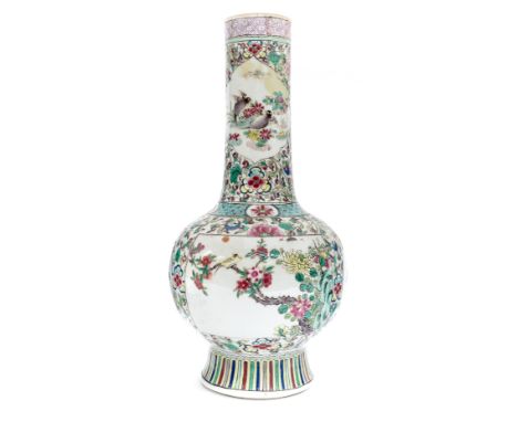 A Chinese famille rose bottle vase, marked Kangxi but mid 19th Century, height  Condition Report: Reduced 