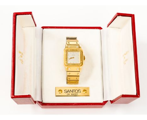 Cartier, a circa 1980 18ct gold Cartier Santos wristwatch, 3cm square silvered dial with diamond numerals, diamond set crown,
