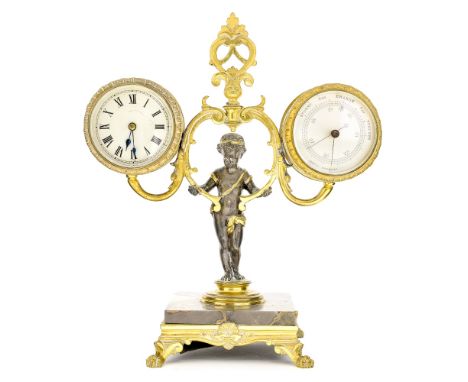 A late 19th Century brass desk timepiece and barometer combined, supported by a standing cupid, square veined marble plinth, 