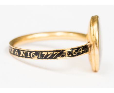 A George III yellow gold mourning ring, oval glazed head to a panel of ivory painted in monochrome with an urn and plinth, th