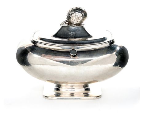 A Dutch late 18th Century tea caddy and cover, plain bombe shaped body on oblong foot, the cover with pomegranate finial and 