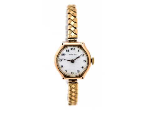 Rolex, a circa 1920's ladies's 9ct gold Rolex wristwatch, 2.5cm white enamel dial, later expanding  strapCondition Report: Ca