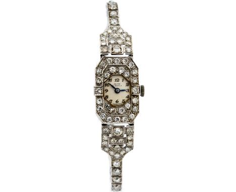 A circa 1940's/1950's diamond and platinum cocktail watch, the octagonal white dial marked OLYMP, winding 17 jewel movement, 