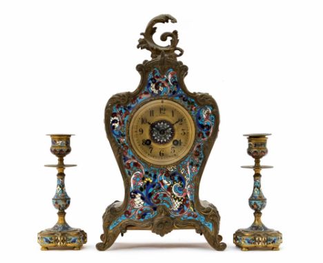 A late 19th or early 20th Century French champleve enamel bracket clock garniture by W. Margrett, Paris, of Rococo Revival de