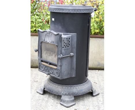 A gas powered conservatory fire. Having a faux fire grate to the front. H75cm. Note: Owners Manual in Office. 
