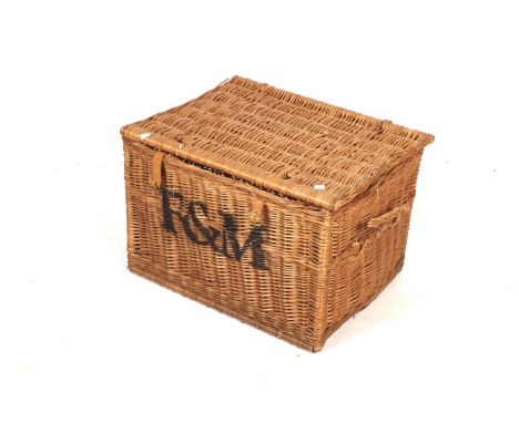An F&M wicker basket. L67cm x D50cm x H46cm
