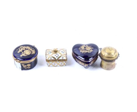 Four Limoges trinket boxes. Comprising two blue glazed boxes with 22k gold leaf decoration, a Petit Main box with floral and 