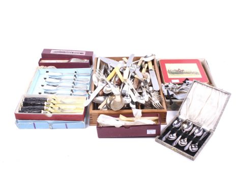 An assortment of flatware. Comprising three silver teaspoons, a salt spoon and collection of plated cultery and placemats