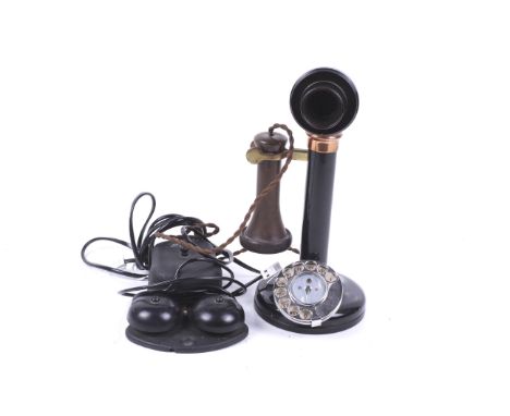 A 1920s candlestick telephone No.150 and bell. The telephone constructed of bakelite and with a chrome dial, H31cm