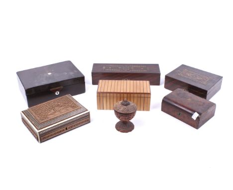 An assortment of 19th century and later boxes. Including an African box carved with a scene of a lion, having an inlaid and s