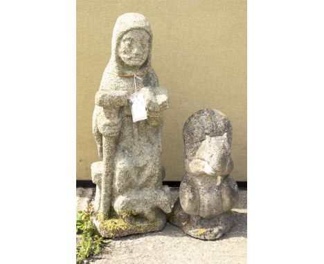A reconstituted figure of a monk in a cowl. Modelled holding a sledge hammer and a book (honest repair), 64cm high overall; t