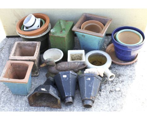 An assortment of garden pots and collectables. Including a blue glazed tapered pot. H29cm, rain gutters, a vintage Esso petro