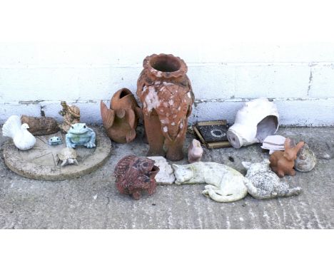 A collection of terracotta and stone garden items including a terracotta fish ornament. Probably for a fountain, 33cm high ov