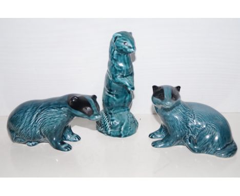 Two Poole badgers with a Squirrel (Height of largest 18cm)