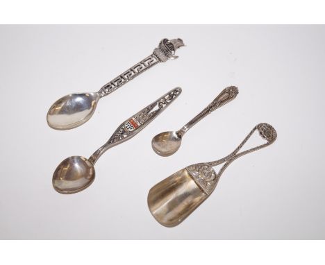 Three continental silver spoons together with a continental silver caddy spoon 