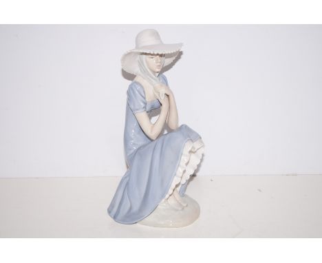 Nao figure of a lady, height 29cm 