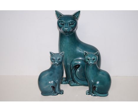 Three Poole cats (Largest 31cm)