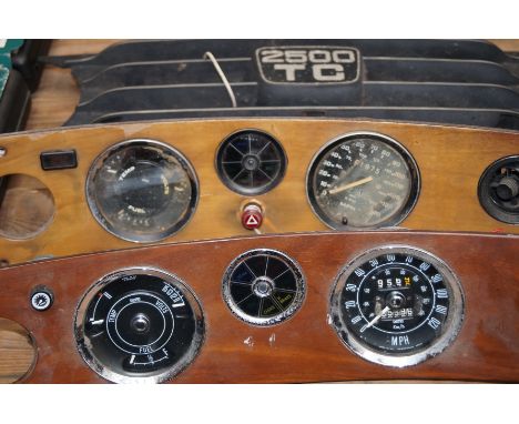 Two vintage car Binicals together with a 2500 TC grill
