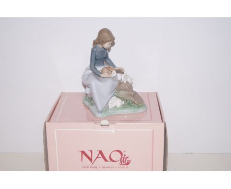 Nao figure of a girl with three rabbits, boxed  