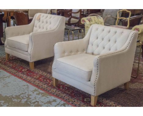 ARMCHAIRS, a pair, club style button backed and brass studded parchment cotton upholstered. (2)