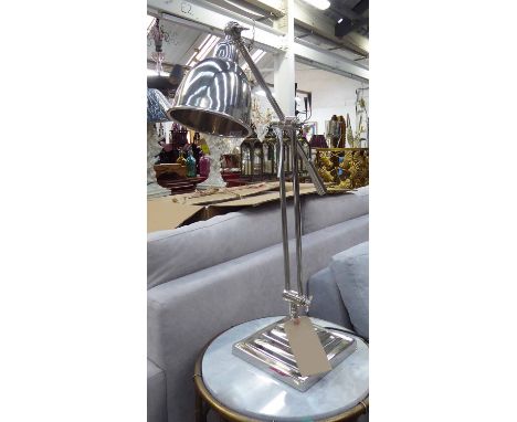 TABLE LAMP, chrome domed shade extending arm on stepped base, 70cm H.