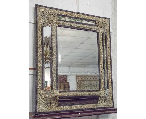WALL MIRROR, 19th century Dutch repoussé silvered metal with cushion marginal bevelled plates, 90cm W x 107cm H.