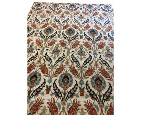  VOYSEY STYLE CARPET, 370cm x 273cm, decorated with polychrome vines and palmettes on ivory field.