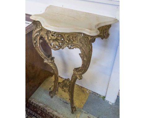 CONSOLE TABLES, a pair, mid 19th century with later serpentine marble tops on carved gilt bases with cabriole supports, each 