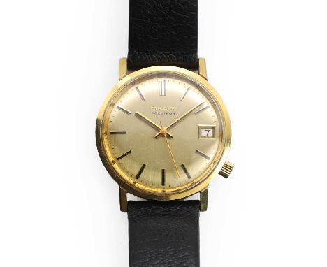 A 9ct gold Bulova mechanical strap watch, with a 34mm diameter case, gilt and black baton hour markers, gilt and black baton 