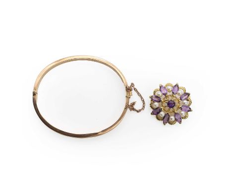 A 9ct gold cultured pearl and amethyst brooch and a 9ct gold bangle, the brooch centrally set with a round cut amethyst, to a
