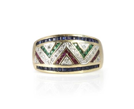 An emerald ruby sapphire and diamond ring,  with a central panel of eight cut diamonds and a zig zag of square step cut emera