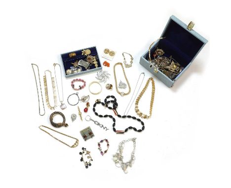 A jewellery box containing a collection of silver and costume jewellery, comprising a silver stylised fern leaf brooch, 50mm 