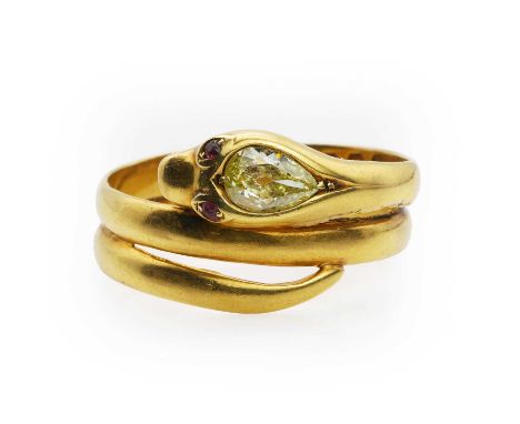 A Victorian 18ct gold diamond set snake ring,  modelled as a coiled snake, with an old pear cut light yellow diamond rub set 