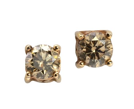 A pair of diamond stud earrings, by Le Vian,  light brown round brilliant cut diamonds with a combined weight estimated as 0.