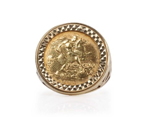 A half sovereign ring, an Elizabeth II half sovereign, dated 1982, spectacle set to an engine turned 9ct gold mount, with pie