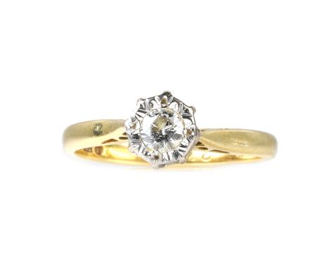 An 18ct gold diamond single stone ring,  a round brilliant cut diamond, set to a white illusion collet, into tapered chenier 