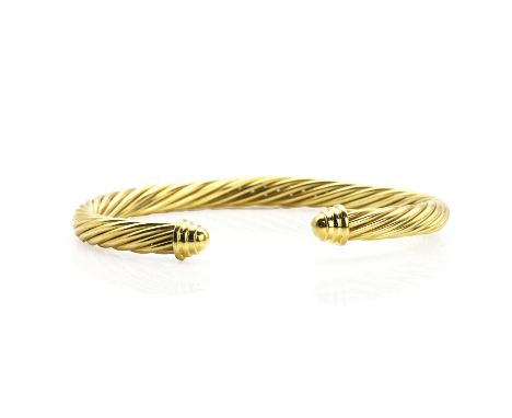 An 14ct gold bangle, by David Yurman, of rope twist design, hollow, signed David Yurman, stamped 14k,10.8gCondition ReportHol