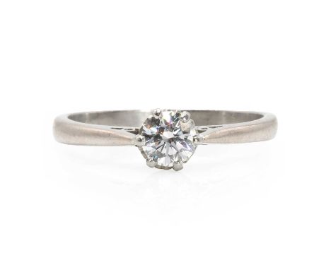 An 18ct white gold single stone diamond ring with a brilliant cut diamond,   estimated as approximately 0.64ct, six claw set 