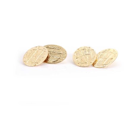 A pair of gold cufflinks, with oval plates hand engraved with the initials NB, to chain link fittings, each plate 18mm x 14mm