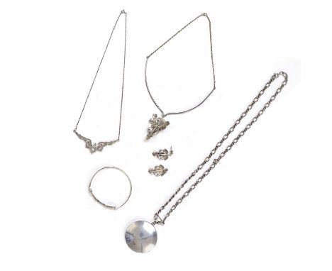 A group of silver jewellery, comprising a silver necklace, with a flat section tapered centrepiece suspending a vine of grape