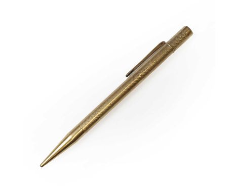 A 9ct gold propelling pencil, with an engine turned barrel, hand engraved facsimile signature to the barrel, hallmarked 9ct g