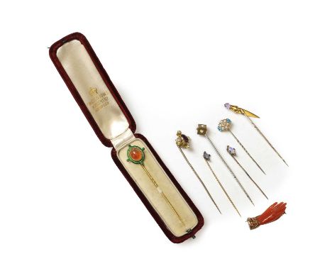 A group of Victorian stick pins and brooches, to include:an agate and enamel stick pin,head tested as approximately 14ct gold