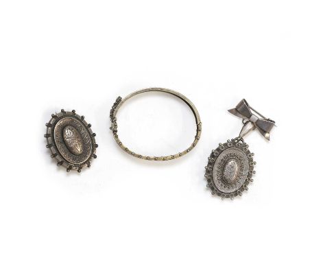 A small group of Victorian silver jewellery,  comprising a late Victorian sterling silver bangle, a Victorian sterling silver