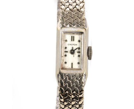 A white gold ladies'  Croton mechanical bracelet watch, with a rectangular case with a silvered dial, case size 10mm x 17mm, 