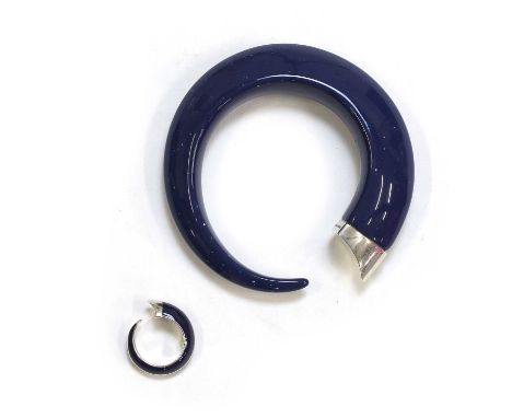 A silver enamel ring and a silver resin bangle, by Shaun Leane, comprising a sterling silver blue enamel 'Tusk' ring, by Shau