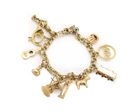A gold charm bracelet, a gold double curb link bracelet, to a concealed box clasp and single safety catch, stamped 585, teste