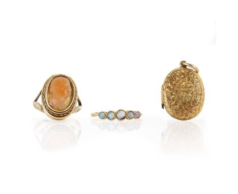 Two gold rings and an Edwardian photo locket,  including, a ring set with five opals, in a rub over setting, in 18ct gold, te