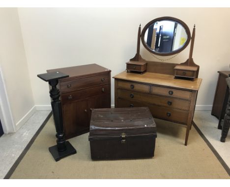 An early 20th Century mahogany cupboard with two drawers over two cupboard doors by M &amp; T Limited of London, 71.5 cm wide